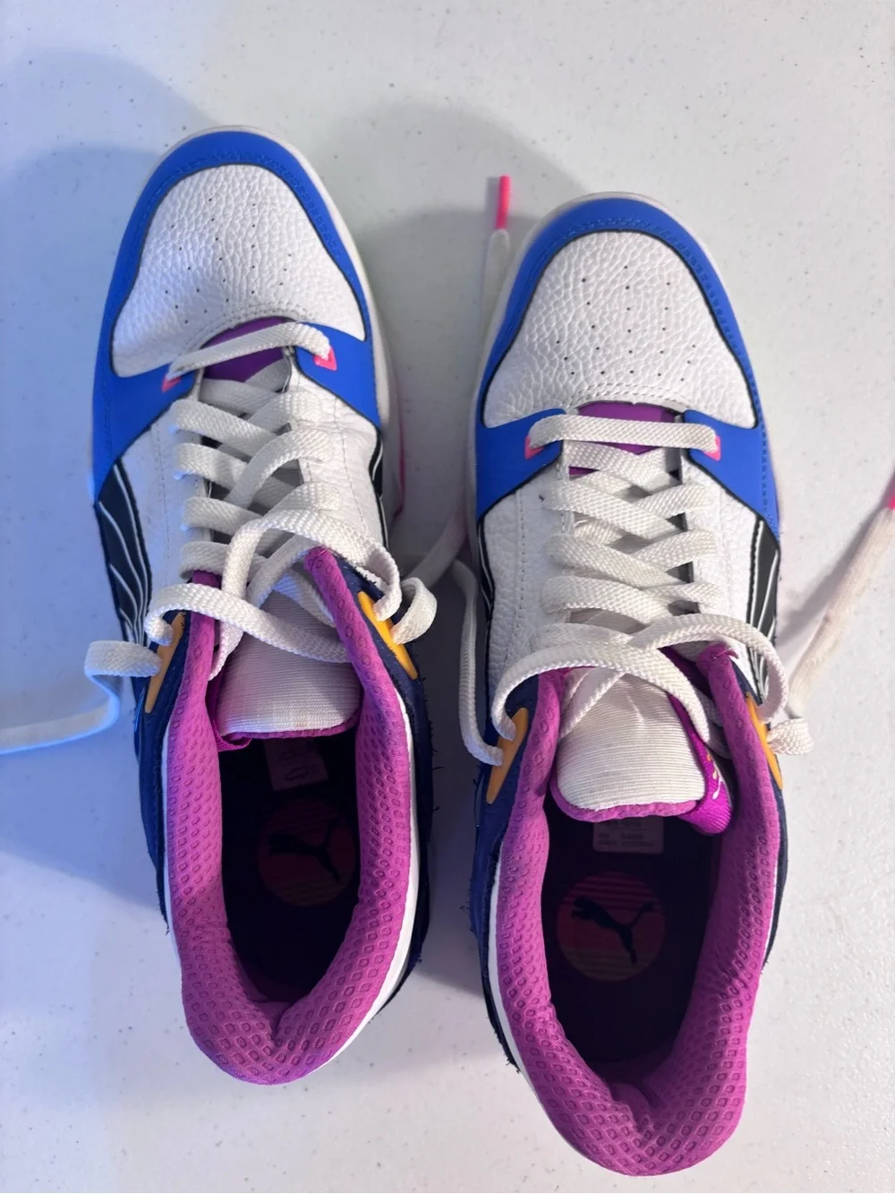 Puma White Sneakers with Blue, Pink and Yellow Accents